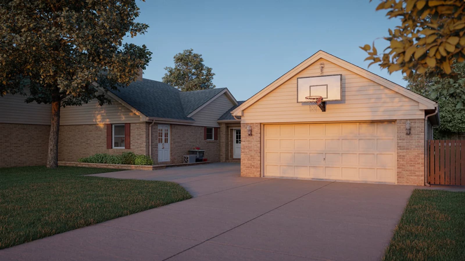 A suburban Colorado driveway and brick home in warm early-evening light.